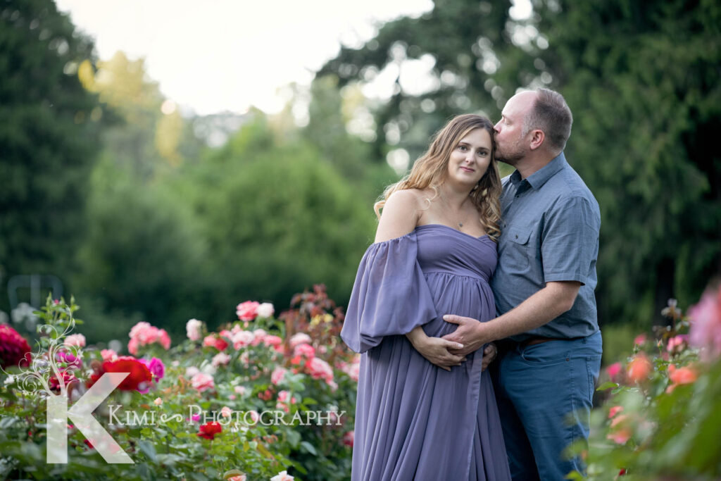 Beautiful and fun maternity session by Kimi Photography in Portland Oregon. Rose garden is a great spot to have your maternity session from May to August.