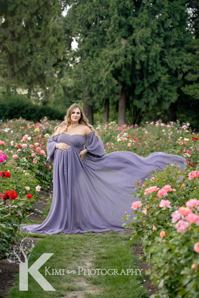 Maternity portrait session by Kimi Photography in Portland Oregon. Rose garden is a great spot to have your maternity session from May to August.